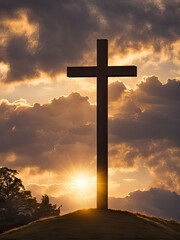 A wooden cross stands on a hill, illuminated by a golden sunset, symbolizing faith, hope, and spiritual reflection against a scenic landscape of rolling hills and dramatic clouds.