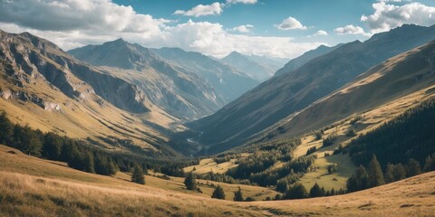 Fototapeta premium Mountain valley landscape with green hills and rocky peaks under a cloudy sky during daytime.