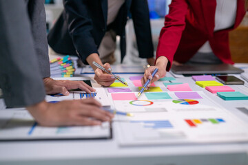Three people are working on a project together