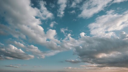 Cloudy sky with patches of blue and varying cloud formations during the day natural atmospheric background climate photography