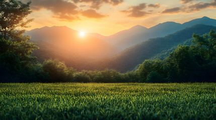 Obraz premium Pixelated Sunset Over Green Meadow and Mountain Range with a Warm Glow