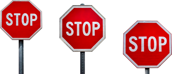 Multiple Red Stop Signs on Metal Poles Against a White Background