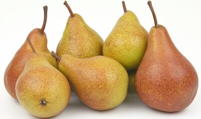 A cluster of ripe pears in varying shades of yellow and red, displayed against a white background