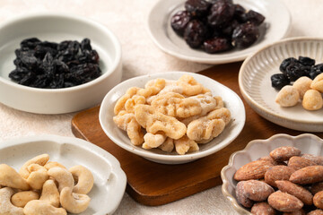 Flavored mixed nuts in bowls.