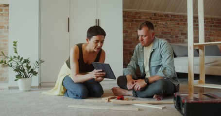 home, they use a tablet looking at the instructions