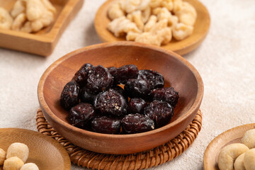 Flavored mixed nuts in bowls.