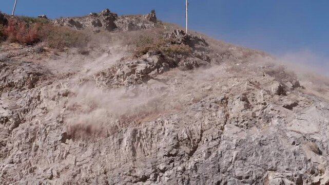 Controlled Rockslide Off a Cliff