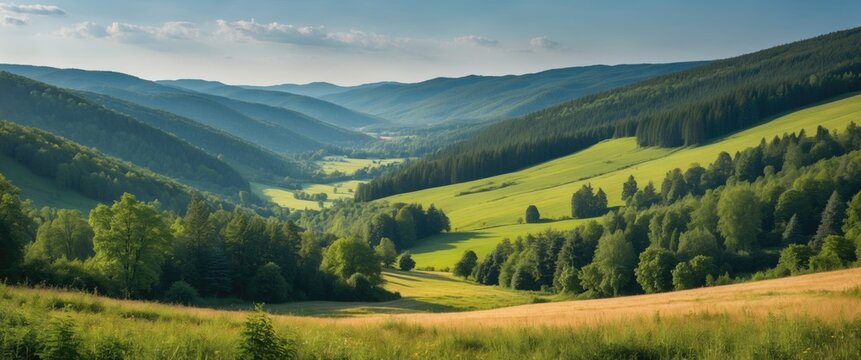 Lush green valleys and rolling hills under a clear sky showcasing summer's vibrant beauty and tranquil natural scenery.