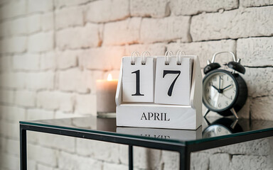 April 17th Calendar Special day notification  wooden desk  with soft candle glow