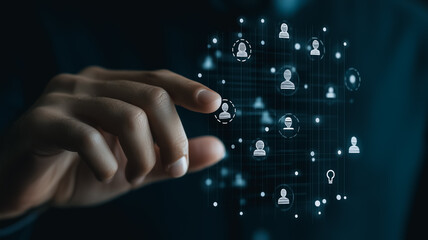 Digital Connections: A hand gently interacts with a network of interconnected profile icons, symbolizing the intricate web of connections and relationships in a modern digital landscape.