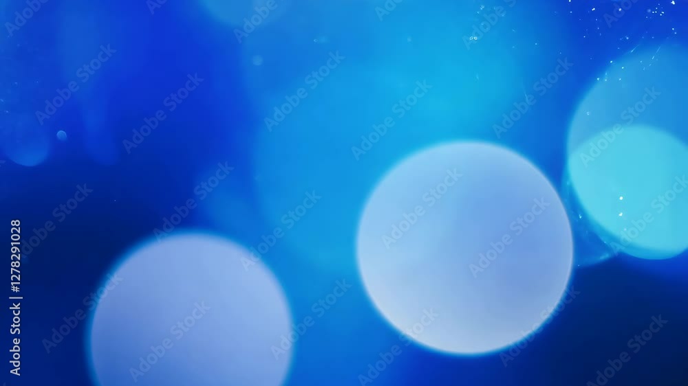 Poster blue canvas with shimmering abstract background and glowing bokeh lights