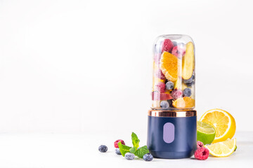 Healthy fruit and berry smoothie drink in portable blender
