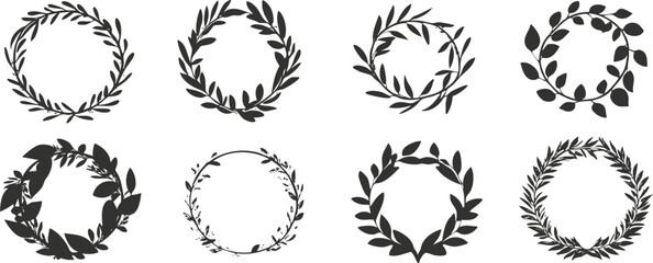 Set of decorative black and white laurel wreath illustrations.