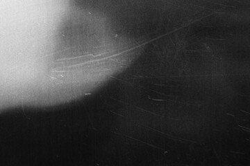 Metal texture with scratches and cracks. Image includes a effect the black and white tones.