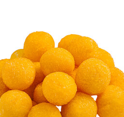 Colorful cheese balls stacked on a plate at a party