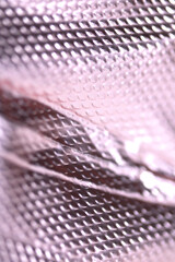 Industrial foil shiny background with rivets and crumpled lines