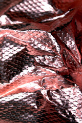 Industrial foil shiny background with rivets and crumpled lines
