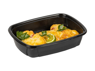 A black container filled with food items on a white background