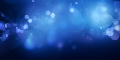 Abstract blue bokeh lights create a stunning blurred background, ideal for designs and creativity.