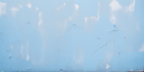 Abstract light blue textured background with subtle cloud-like patterns.
