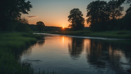 Tranquil Summer Evening at the River with Sunset Reflections Surrounded by Nature's Serenity and Lush Greenery