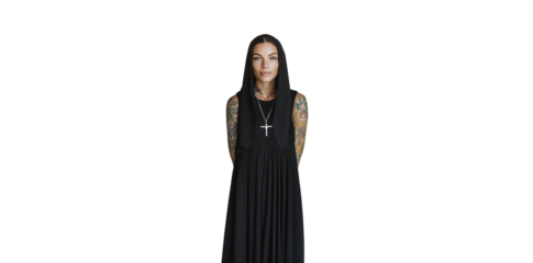 Stunning portrait of a tanned woman with long dark hair and intricate tattoos, showcasing a stylish black dress and vibrant accessories in a minimalistic setting