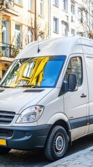 White van parked on city street