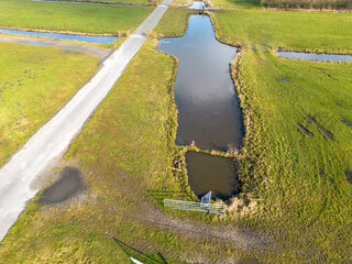 Ice on the ditches on cold february day