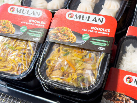Packaged mulan noodles with chicken and vegetables in store display