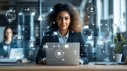 Confident businesswoman using laptop, digital interface.