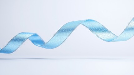 Fototapeta premium Creative blue ribbon twisting in studio space artistic photography minimalist environment close-up view