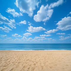 Obraz premium Beautiful summer beach with a blue sky and white clouds in the background. This is a travel concept for a vacation by the sea, with a golden sand beach and a beautiful natural landscape view. 