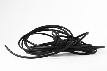 Insulated black electrical wire isolated on white