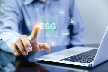 Investment in ESG Renewable energy, global warming. Green Energy Renewable Sustainable carbon neutrality 2050. Environmental protection,Net zero emission. ESG icons pop up on the computer screen