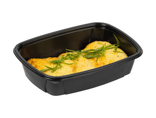 A black container filled with various foods on a white background