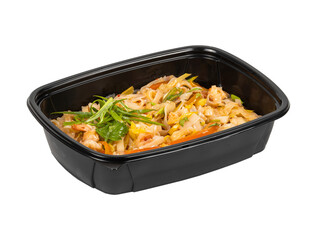 Black plastic container filled with food on a white background