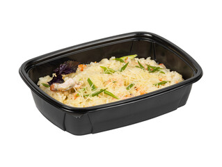 A black plastic container that is filled with food set on a white background
