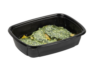 A black container filled with various foods on a white background