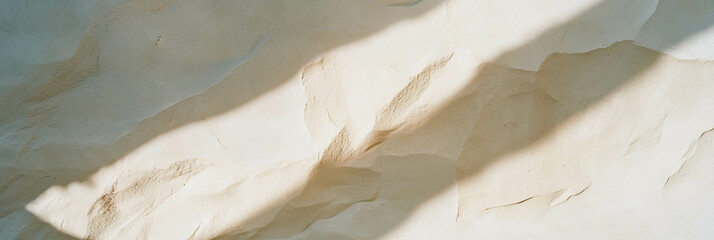 Obraz premium Natural beige wall texture with soft shadows for architectural design and backgrounds