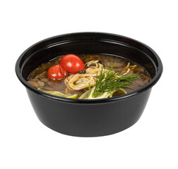 A black bowl of soup and tomatoes on a white background