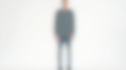 Fototapeta premium A blurred image of a man in the middle of a white background.