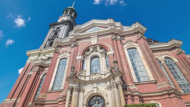 St. Michael's Church timelapse hyperlapse, Hamburg, Germany. Hauptkirche Sankt Michaelis, or Michel is the most famous Lutheran church in the city, featuring a baroque tower and iconic clock