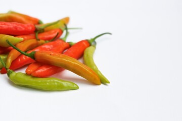 harvested chilies with isolated white background