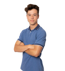 Young brunette boy standing with arms folded isolated over transparent background. PNG transparent.