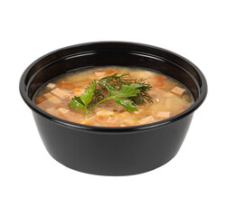A bowl of soup with fresh parsley on top against a white background