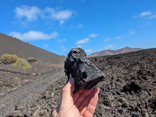 VOLCANIC ROCK formation on Lanzarote Island in Canary Islands, remnant of past eruptions shaping...