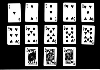 A montage of vintage playing cards in the same suit.