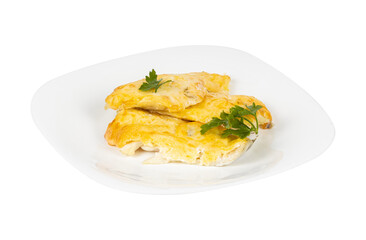 A white plate with fried food and parsley on a white background
