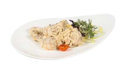 A plate with food and vegetables on a white background