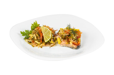 A white plate with two food pieces and a slice of lime